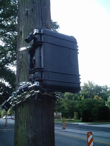 mystery boxes on phone poles